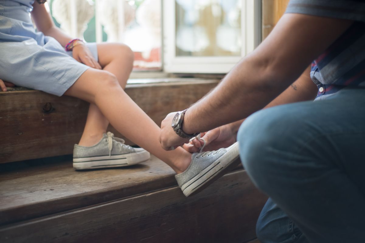 Parent helping child